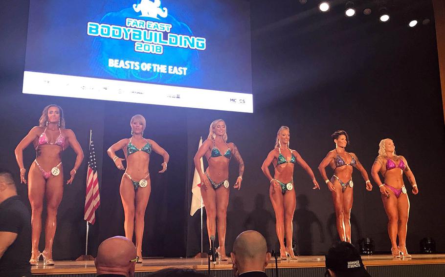 Contestants pose during the19th annual Far East Bodybuilding Competition at Camp Foster, Okinawa, Sunday, Aug. 5, 2018.