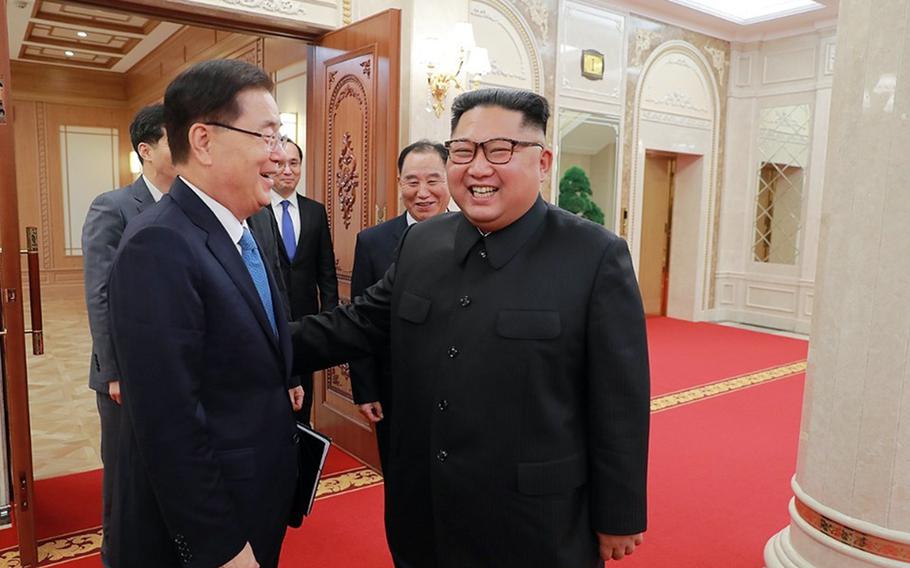 North Korean leader Kim Jong Un, right, meets with South Korean envoys in Pyongyang, North Korea, Wednesday, Sept. 5, 2018.
