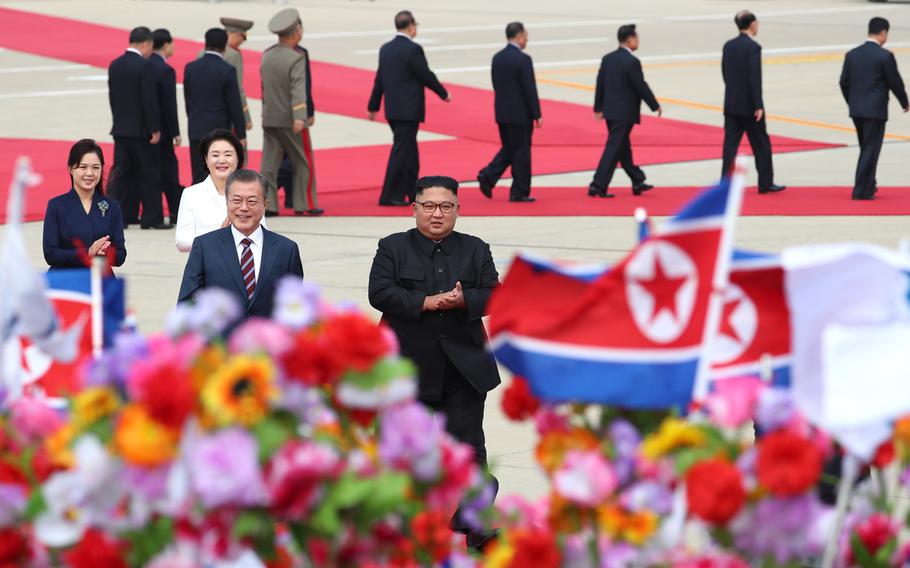 South Korean president Moon Jae-in (left) and North Korean leader Kim Jong Un meet in North Korea for a summit on Sept. 18, 2018. 