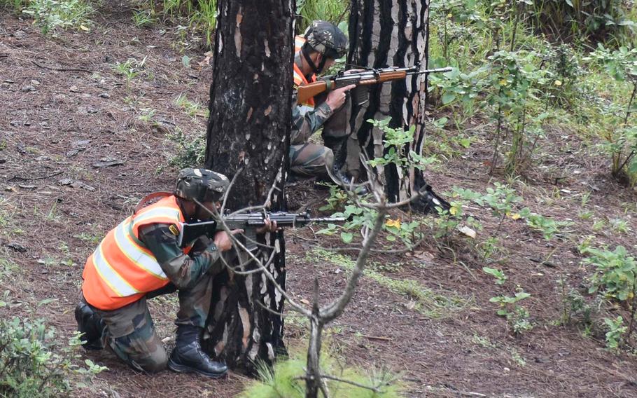 Indian army soldiers pull security during a search and destroy demonstration during Yudh Abhyas Sept. 24, 2018, at Chaubattia Military Station, India. 