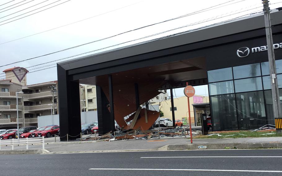 The roof of a car dealer in Chatan, Okinawa was damaged in Typhoon Trami over the weekend. Trami, the 28th numbered storm and fifth super typhoon of the season, battered Okinawa with 103-mph sustained winds and 132-mph gusts overnight Saturday into Sunday morning.