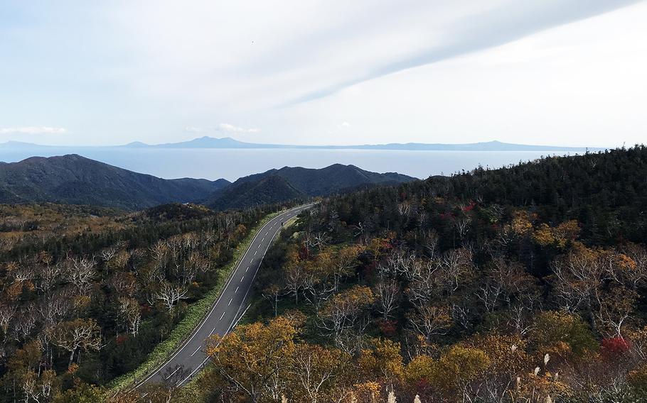 Russia-controlled Kunashiri Island is seen in the distance from the Shiretoko Peninsula on Hokkaido, Japan. 