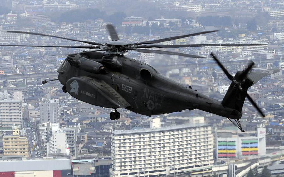 An MH-53E Sea Dragon prepares to land at a Japan Self-Defense Force air field in Sendai, Japan, during earthquake- and tsunami-relief efforts in 2011.
