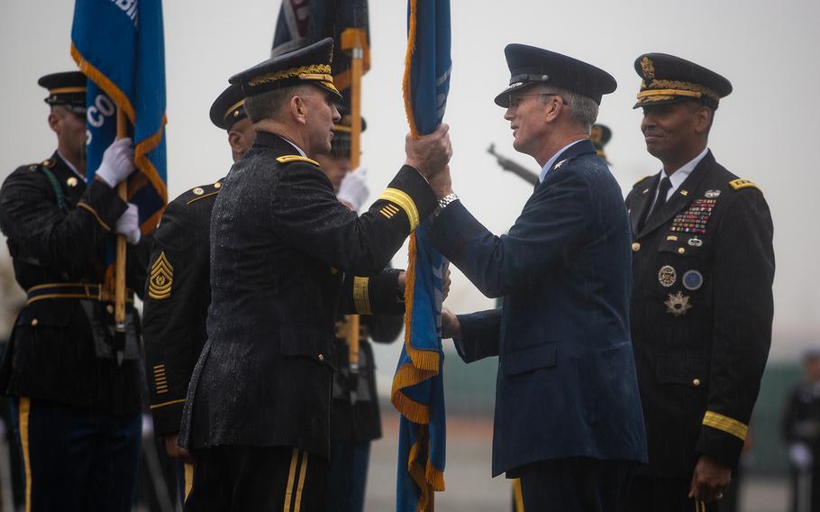 Gen. Paul Selva, vice chairman of the Joint Chiefs of Staff, right, passes the United Nations Command colors to incoming U.S. Forces Korea commander Gen. Robert Abrams at Camp Humphreys, South Korea, Thursday, Nov. 8, 2018. 