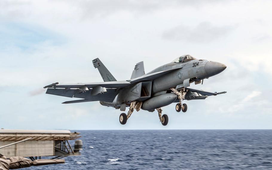 An F/A-18E Super Hornet launches from the flight deck of the USS Ronald Reagan. Two Navy pilots are safe after ejecting from an F/A-18 Super Hornet that “experienced a mechanical issue” over the Philippine Sea on Monday morning, a Navy statement said.