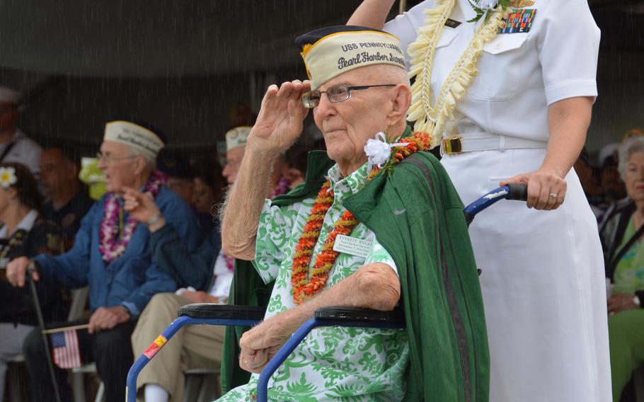 Everett Hyland, a Pearl Harbor survivor from the USS Pennsylvania, represents his fellow survivors in a salute to the USS Michael Murphy sailing through Pearl Harbor, Friday, Dec. 7, 2018, during a ceremony commemorating the 1941 surprise attack.