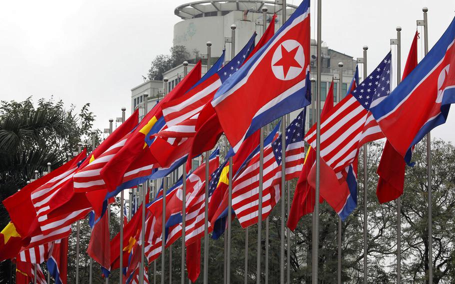 National flags of the U.S., North Korea and Vietnam are displayed at the International Media Center for the U.S-North Korean summit in Hanoi, Vietnam, Monday, Feb. 25, 2019.