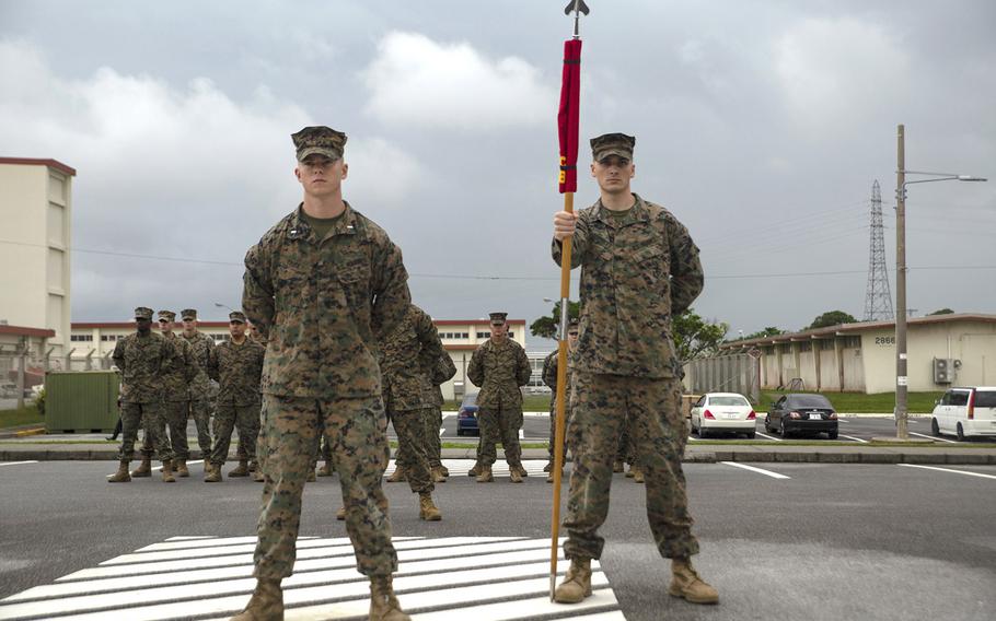 The official party of the Defense Cyberspace Operations Internal Defense Measures Company stand at parade rest during the company's activation ceremony at Camp Hansen, Okinawa, Japan, Dec. 7, 2018. 