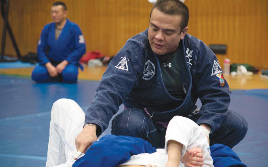 Rodrigo Gomez teaches jiujitsu at Misawa Air Base, Japan, Feb. 17, 2016.