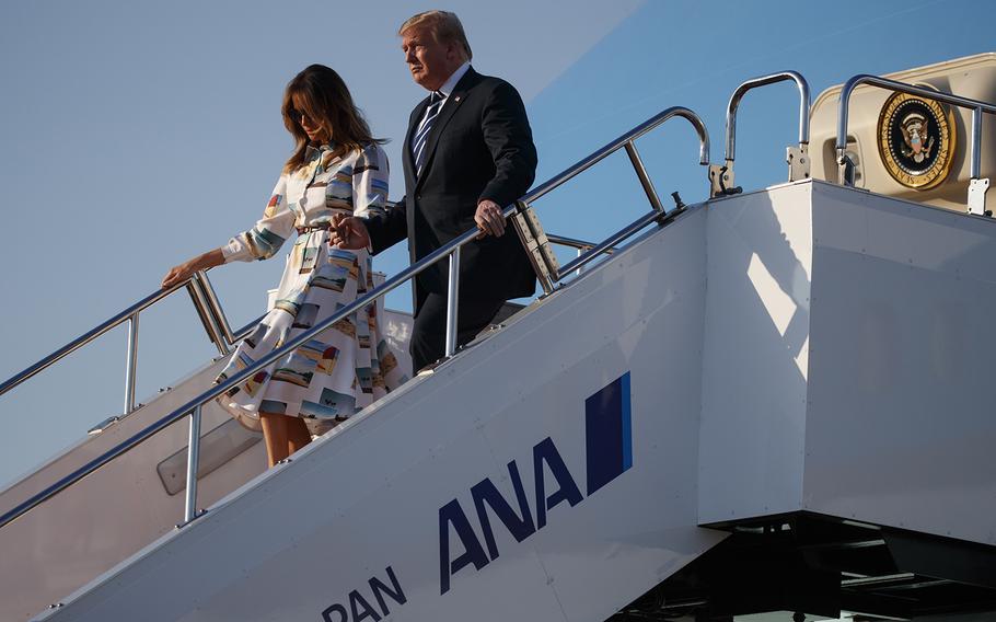 President Donald Trump and fist lady Melania Trump arrive at Haneda International Airport for a state visit, Saturday, May 25, 2019, in Tokyo. 