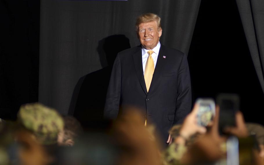 President Donald Trump greets servicemembers aboard the amphibious assault ship USS Wasp at Yokosuka Naval Base, Japan, Tuesday, May 28, 2019. 