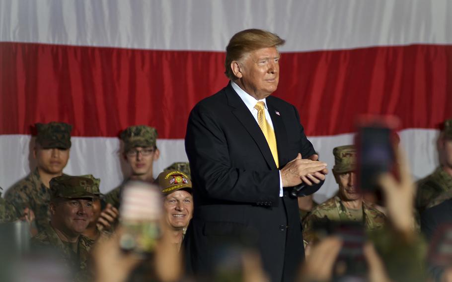 President Donald Trump greets servicemembers aboard the amphibious assault ship USS Wasp at Yokosuka Naval Base, Japan, Tuesday, May 28, 2019.