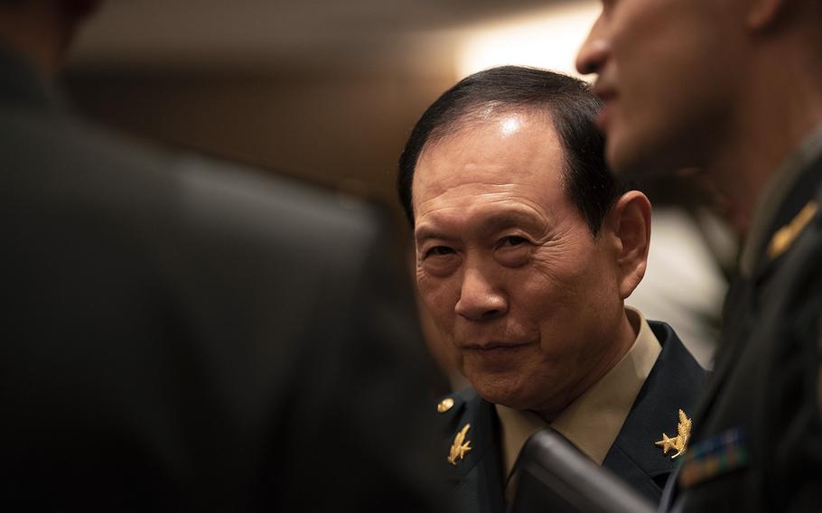 Chinese defense minister Gen. Wei Fenghe attends an evening reception during the Shangri-La Dialogue in Singapore, Friday, May 31, 2019.