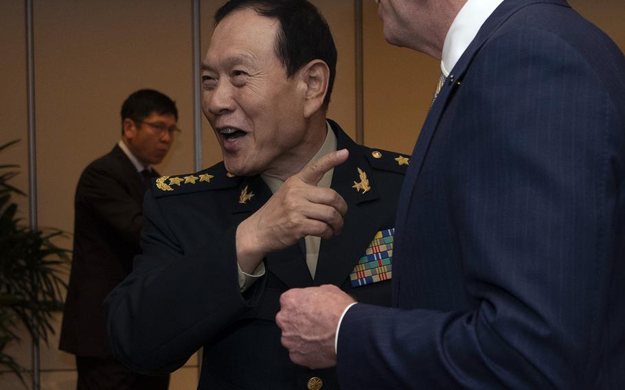 U.S. Acting Secretary of Defense Pat Shanahan meets with Chinese defense minister Gen. Wei Fenghe during the Shangri-La Dialogue in Singapore, Friday, May 31, 2019.