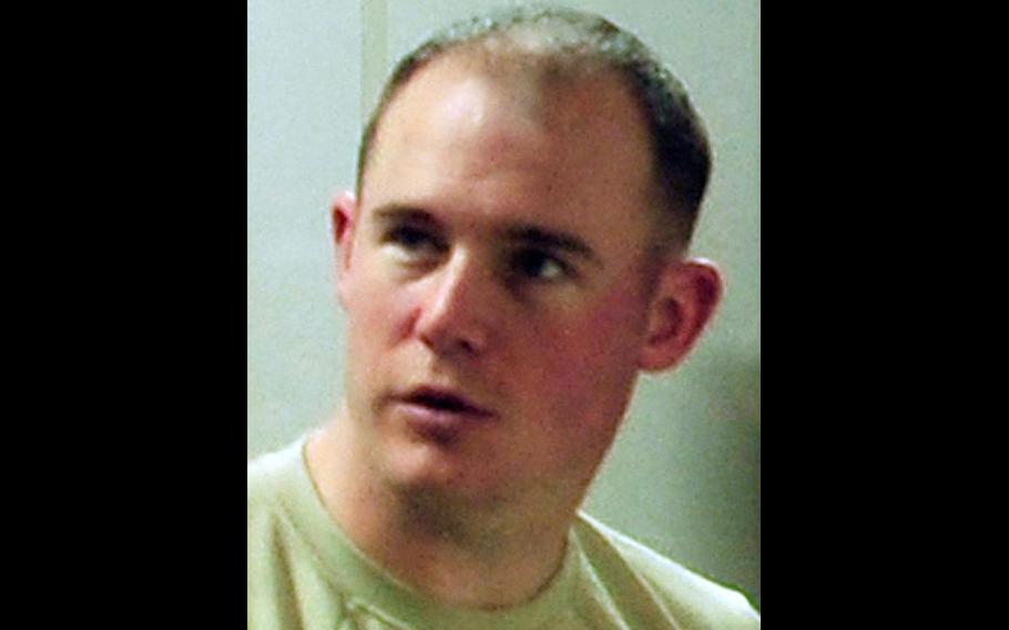 Tech Sgt. Curtis Eccleston in an Air Force photograph from March when he was the special planning supervisor for the 733rd Air Mobility Squadron at Kadena Air Base. Eccleston was found dead with a neck wound Sunday in an off-base apartment.