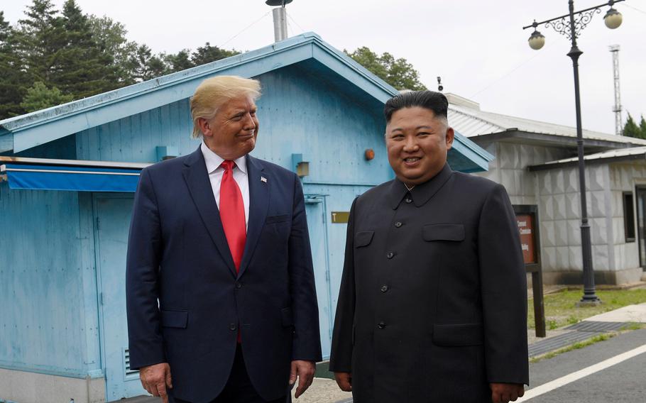 President Donald Trump, left, meets with North Korean leader Kim Jong Un at the border village of Panmunjom in Demilitarized Zone, South Korea, Sunday, June 30, 2019. 