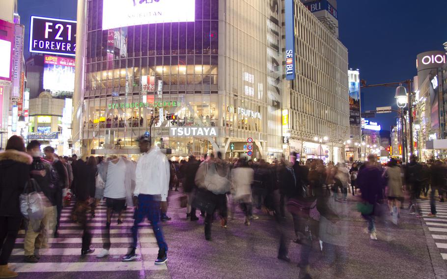 Pedestrians cross the crowded streets in Tokyo's Shibuya area in March 2014. A sailor was found not guilty Wednesday, Aug. 14, 2019, of sexually assaulting a fellow sailor after a night of drinking in the popular nightlife district.