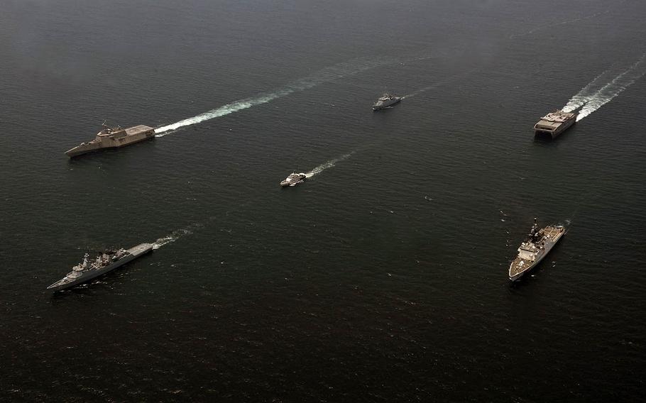 Ships of the U.S. Navy, Malaysian Maritime Enforcement Agency and Royal Malaysian Navy sail together as part of Maritime Training Activity Malaysia 2019 on Friday, Aug. 16, 2019.