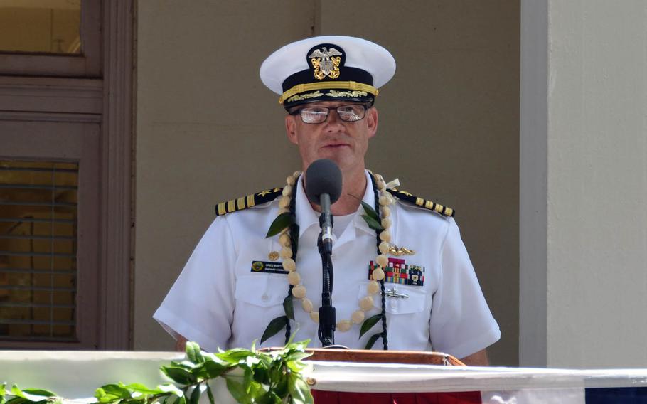 Capt. Gregory Burton, commander of Pearl Harbor Naval Shipyard, speaks at a ceremony, marking the centennial anniversary of the shipyard's Dry Dock 1, on Wednesday, Aug. 21, 2019.