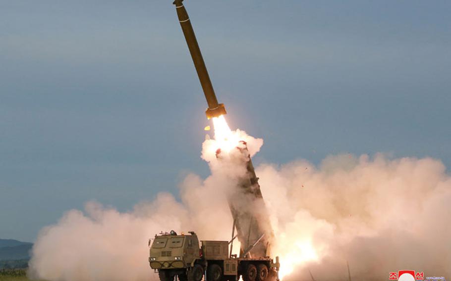 North Korea shows the launch of what it called a "super-large multiple rocket launcher system" that was observed by leader Kim Jong Un.