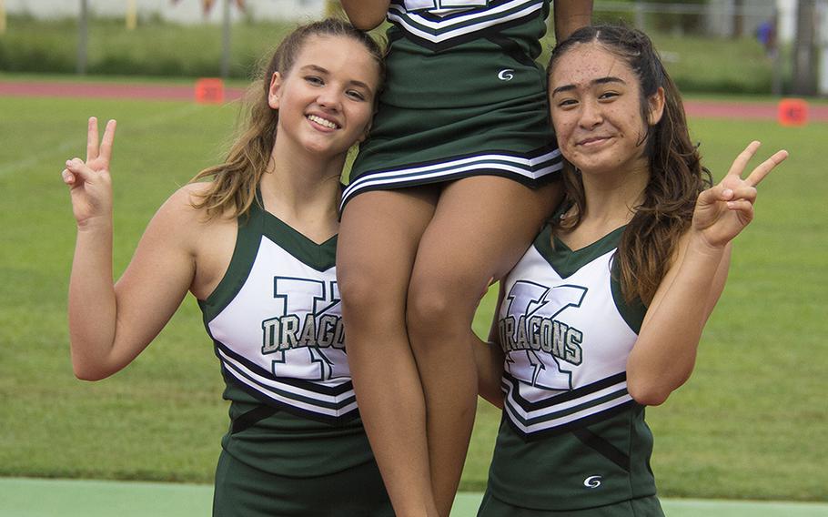 Kubasaki Dragons cheerleaders pose for a photo during halftime during the first football game of the season against the Kadena Panthers at Mike Petty Stadium on Camp Foster, Okinawa, Japan, Saturday, Sept. 7, 2019. 