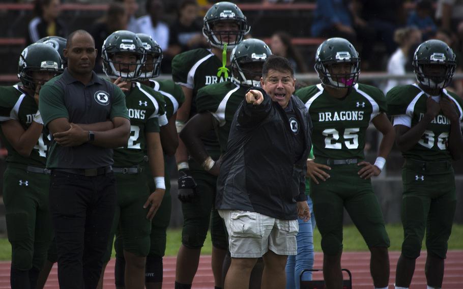 A coach from the Kubasaki Dragons yells play formations during the first football game of the season against the Kadena Panthers at Mike Petty Stadium on Camp Foster, Okinawa, Japan, Saturday, Sept. 7, 2019. 