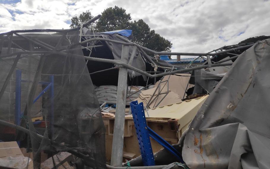 Damage from a container that fell from a U.S. military helicopter in South Korea, Monday, Sept. 23, 2019. 