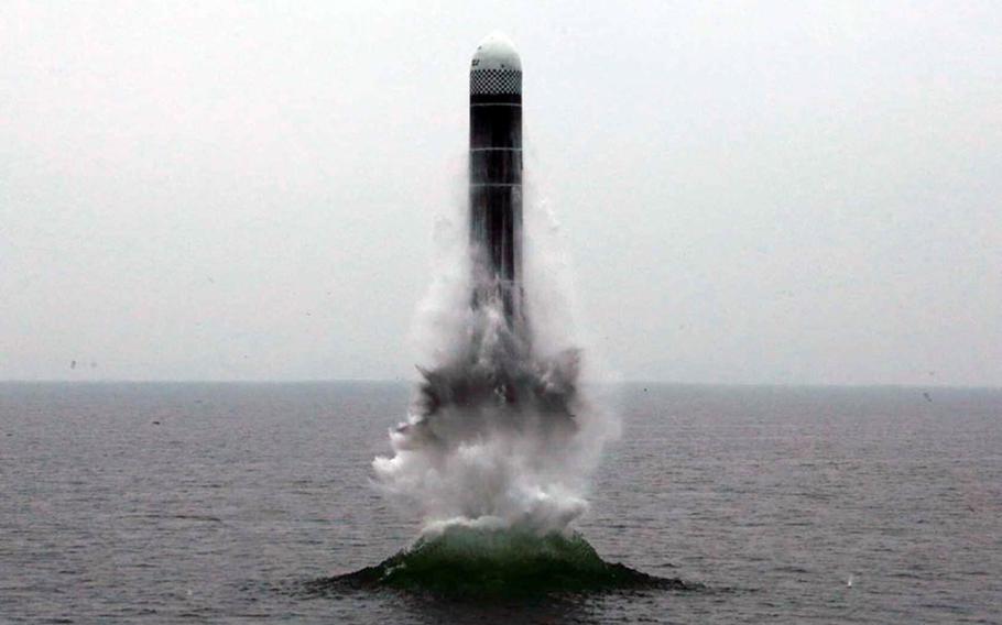 This image released Thursday, Oct. 3, 2019, by North Korea's state-run newspaper, Rodong Sinmun, purports to show a submarine launched ballistic missile test from the previous day. 
