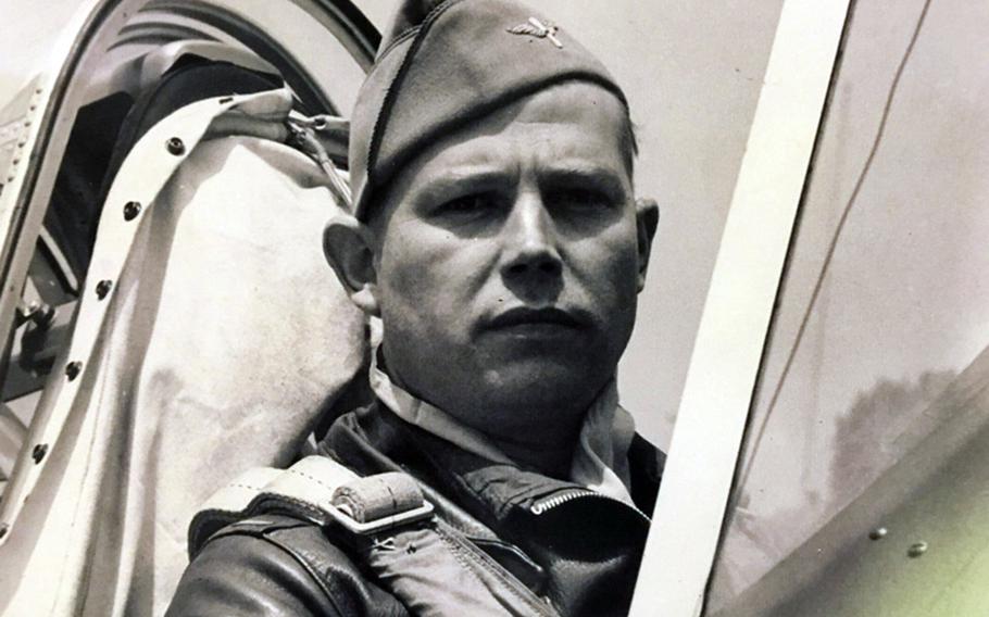 Donn Young sits in a cockpit in this undated photo from World War II.