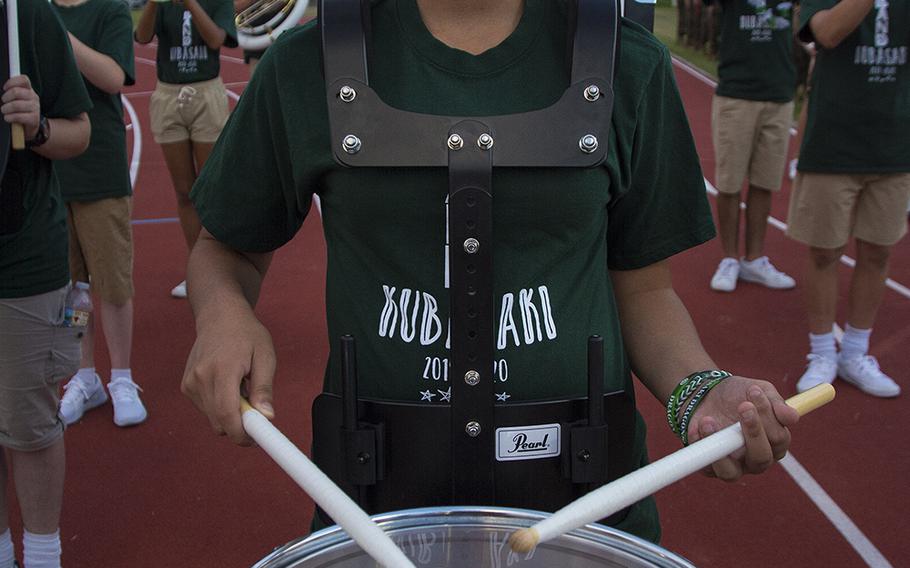 A drummer for the Kubasaki High School band keeps the beat during a game against Camp Humphreys at Camp Foster, Okinawa, Friday, Oct. 25, 2019. 