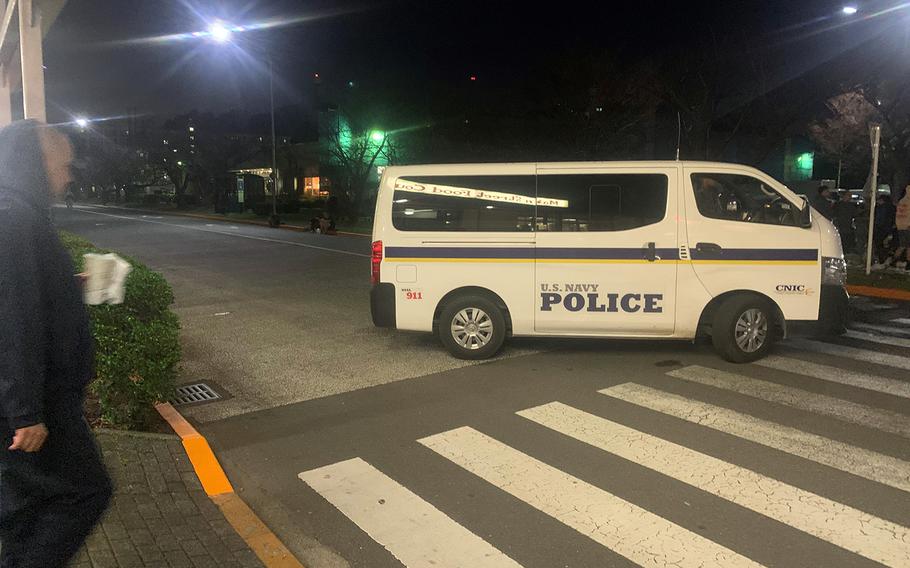 Navy police secure an area near a barracks for unaccompanied sailors after a bomb threat at Yokosuka Naval Base, Japan, Wednesday, Nov. 6, 2019. 
