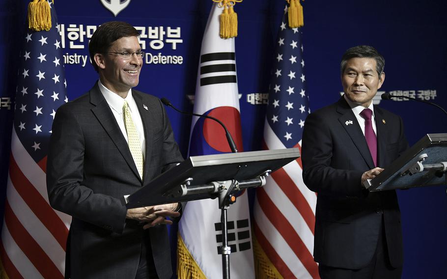U.S. Defense Secretary Mark Esper, left, and South Korean Defense Minister Jeong Kyeong-doo, right, hold a joint press conference after the 51st Security Consultative Meeting at the Defense Ministry in Seoul Friday, Nov. 15, 2019. 