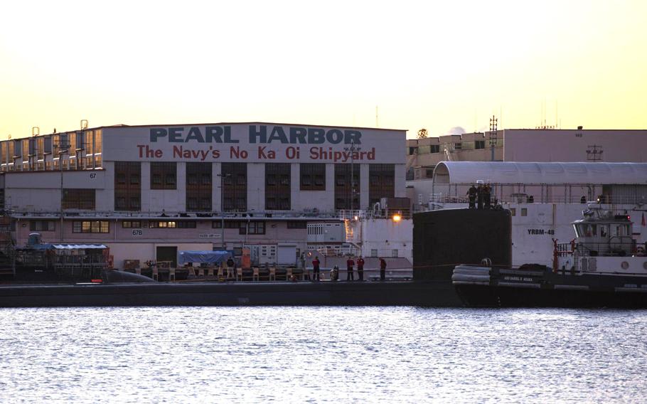 Los Angeles-class fast-attack submarine USS Jefferson City departs from Pearl Harbor Naval Shipyard in this undated file photo.