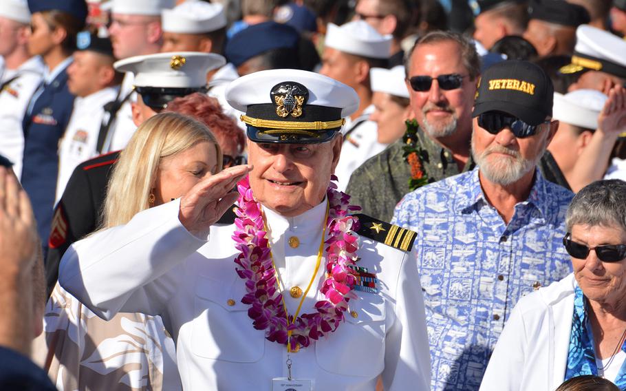 Lou Conter, 98, one of only three living survivors USS Arizona survivors, salutes during the Walk of Honor after a Dec. 7, 2019, ceremony at the Pearl Harbor National Memorial marking the surprise attack 78 years ago.