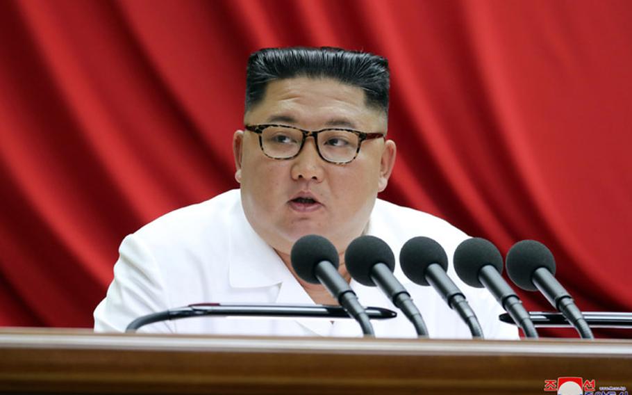 North Korean leader Kim Jong Un speaks at a ruling Workers' Party meeting in Pyongyang on Monday, Dec. 30, 2019.