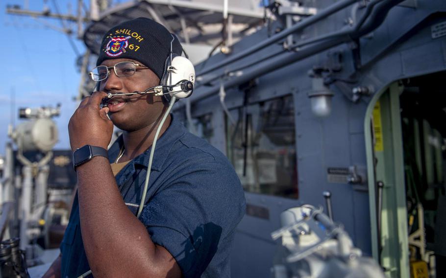 Seaman Marshall Key works aboard the guided-missile cruiser USS Shiloh during a transit of the Taiwan Strait, Thursday, Jan. 16, 2020. 