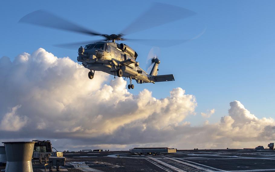 A MH-60 Seahawk helicopter takes off in the Indo-Pacific region. 