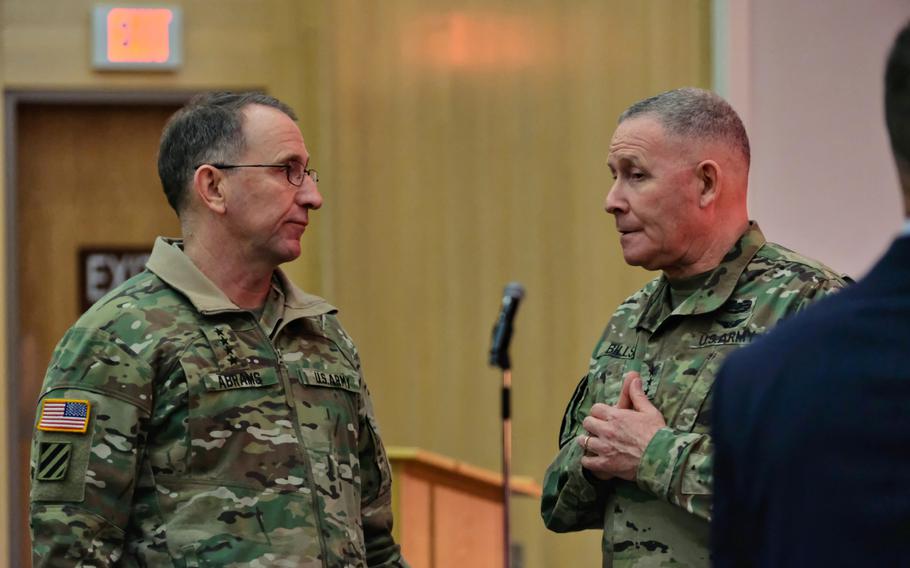 U.S. Forces Korea commander Gen. Robert Abrams and Eighth Army commander Lt. Gen. Michael Bills talk briefly following a town hall-style meeting at the Four Chaplains Memorial Chapel, Camp Humphreys, South Korea, Monday, Feb. 24, 2020.



