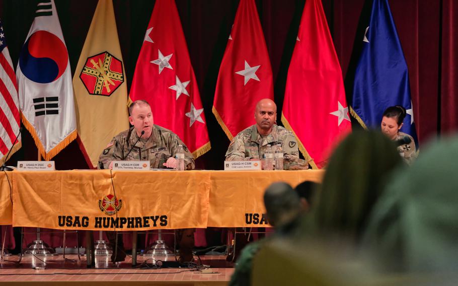 Camp Humphreys Garrison Commander Col. Michael Tremblay and Command Sgt. Maj. Antonio Lopez announce U.S. Forces Korea's decision to move to health protection condition Charlie during a town hall meeting at the Four Chaplains Memorial Chapel, Camp Humphreys, South Korea, Monday, Feb. 24, 2020.



