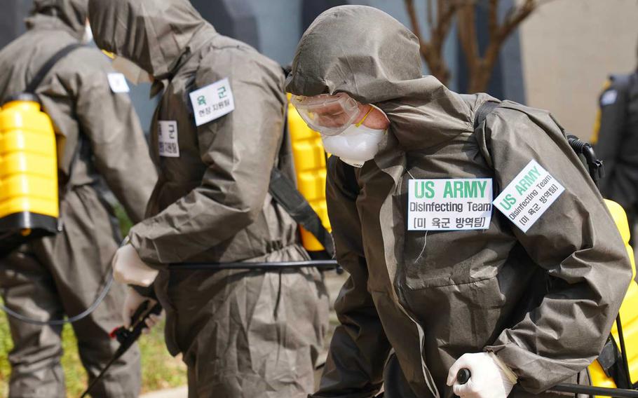 Soldiers from the 19th Expeditionary Sustainment Command join South Korean troops in a disinfectant operation on Friday, March 13, after a coronavirus outbreak in Daegu. 