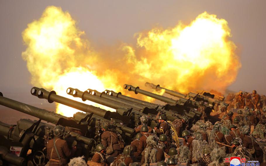 In this photo released Saturday, March 21, 2020 by the state-run Korean Central News Agency, North Korean troops participate in an artillery fire competition between large combined Army units “on the western front” on Friday, March 20.