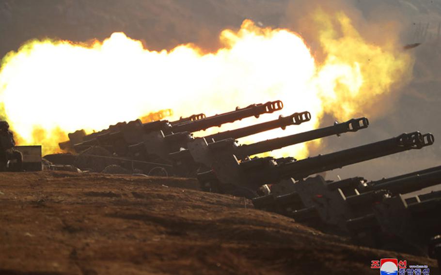 In this photo released Saturday, March 21, 2020 by the state-run Korean Central News Agency, North Korean troops participate in an artillery fire competition between large combined Army units “on the western front” on Friday, March 20.