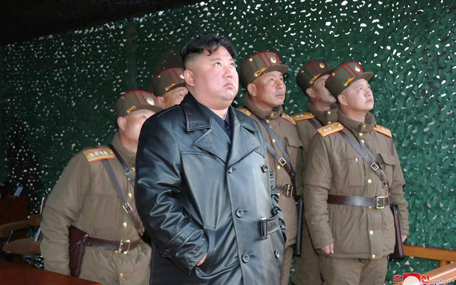 In this photo provided by the North Korean government, North Korean leader Kim Jong Un inspects military exercise at an undisclosed location in North Korea on Saturday, March 21, 2020.