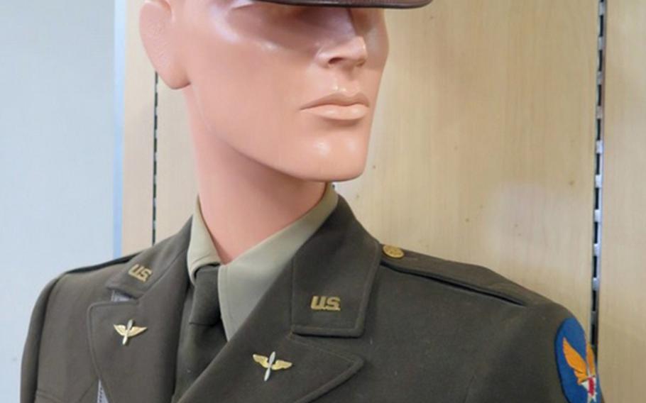 A full World War II-era Army Air Corps uniform, complete with insignia, shirt, pants, tie and hat, is among the uniforms being auctioned from the collection of the Home of the Brave museum in Honolulu. 