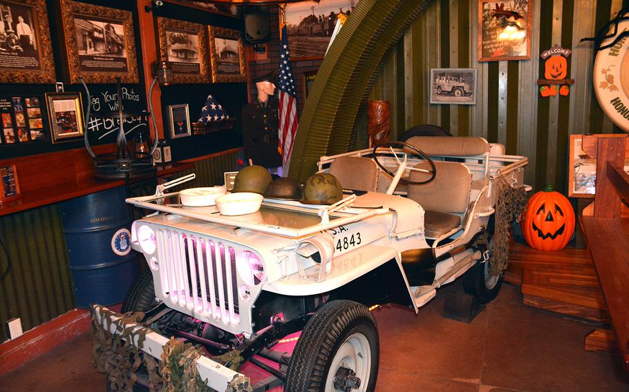 This 1942 Willys Jeep, which has no engine or transmission, was centerpiece decor at the Home of the Brave brew pub in Honolulu.