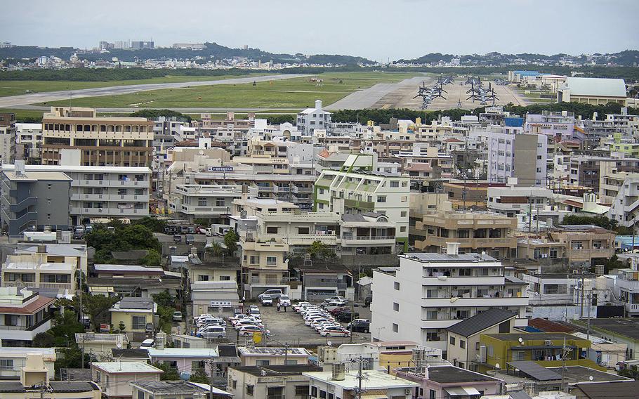 Military aircraft sit on the flight line at Marine Corps Air Station Futenma, Okinawa, in April 2019. 