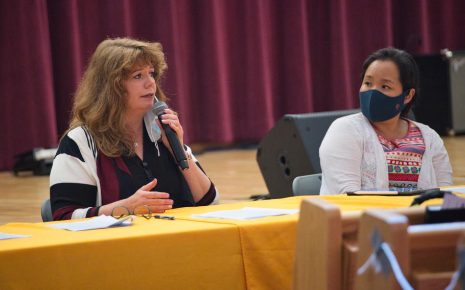 Humphreys High School principal Erin Grazak responds to a parent's question during a town hall meeting about the upcoming school year at Camp Humphreys, South Korea, Wednesday, July 29, 2020. 