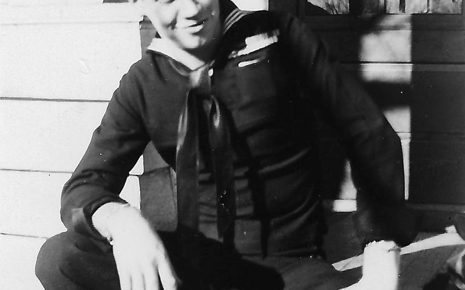Robert McGranaghan poses in his Navy uniform during World War II. 