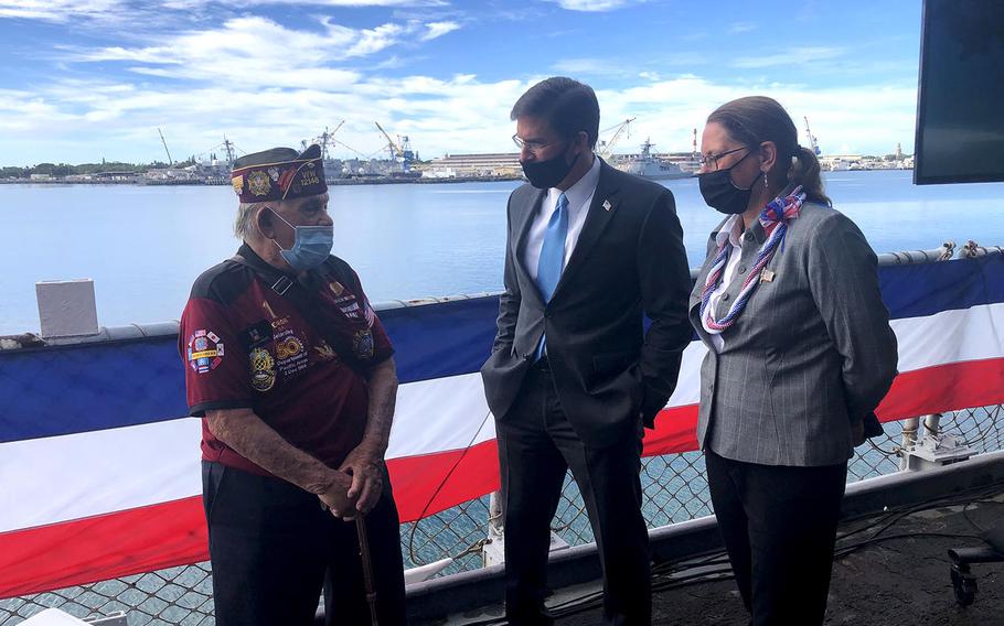 Wendell Newman, a 92-year-old Army veteran of World War II, speaks with Secretary of Defense Mark Esper and his wife, Leah, on the Battleship Missouri Memorial in Hawaii, Sept. 2, 2020.