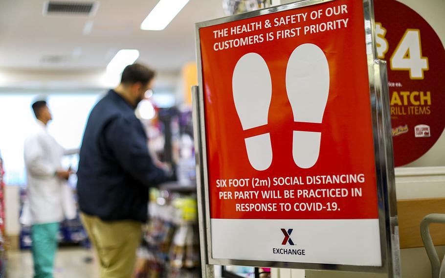 A sign outside an exchange store reminds customers to practice social distancing at Camp Foster, Okinawa, April 3, 2020.